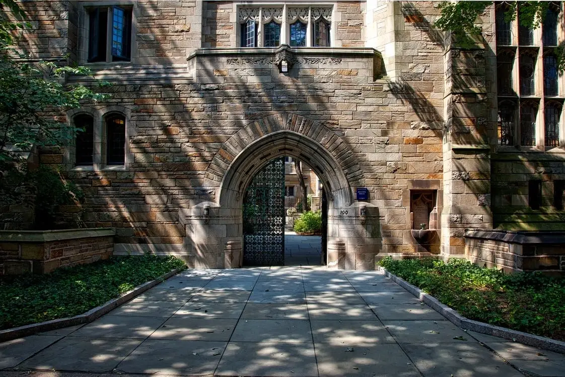 Entrance to a university building on Idealist's blog post, Are You Financially Ready for the Cost of Graduate School?