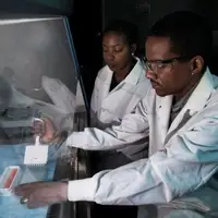 professor and student in research lab