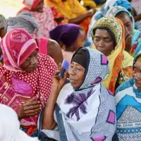 Rural Women listening to Audiopedia in Tanzania