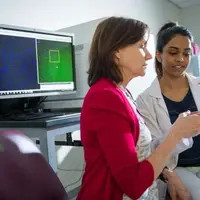 Professor and student working in the Cancer Research Center