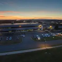 Aerial view of Health Sciences Campus George Education Center building at sunset