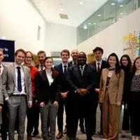 Photo of The Future Society Team at The Athens Roundtable Sixth Edition at the OECD in Paris in December 2024