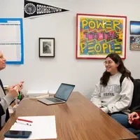 CR students meeting with professor