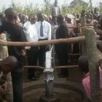 volunteer celebrating clean water after speeding time with community