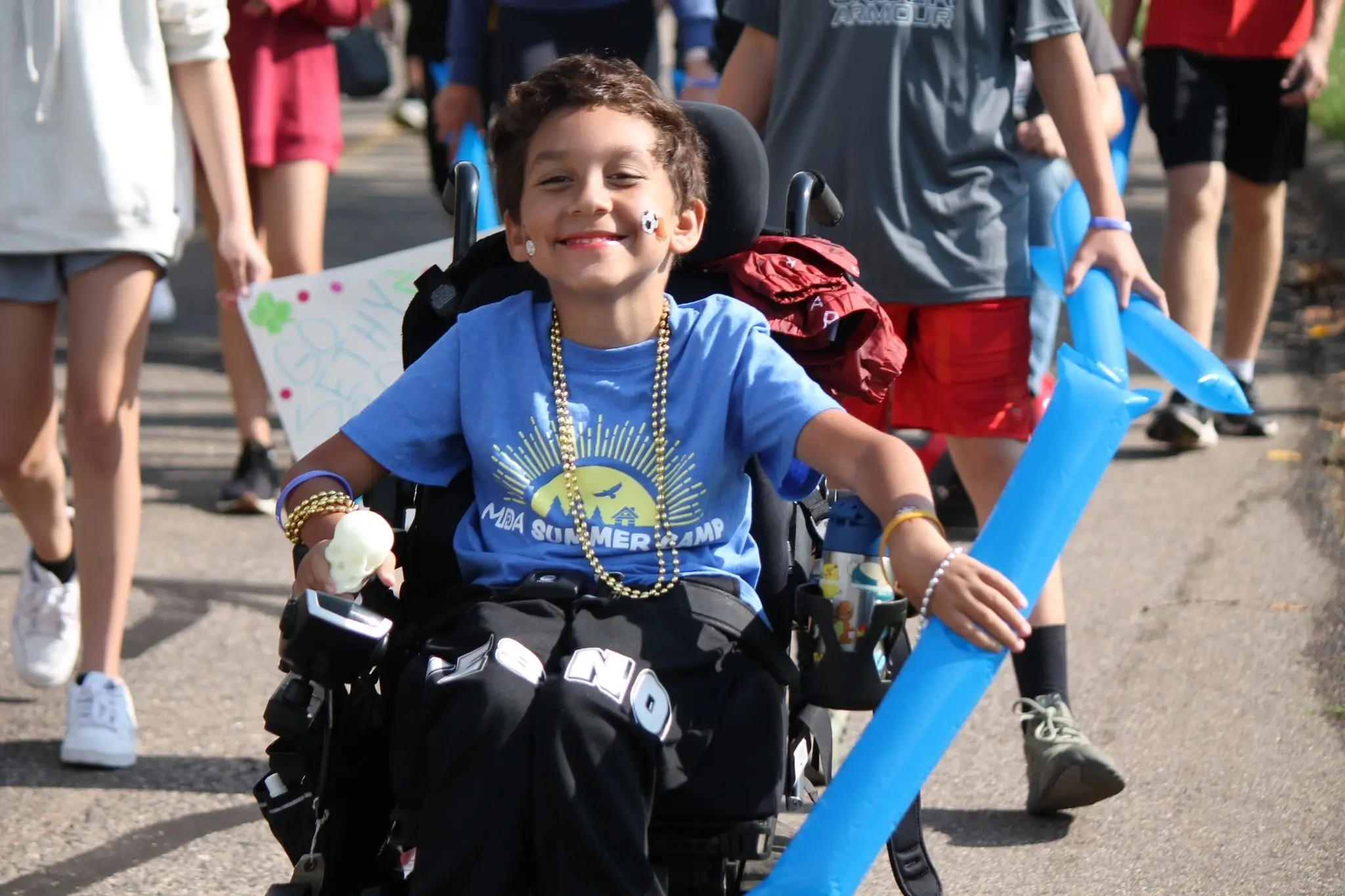 Muscle walk of Massachusetts Volunteer Face Painter