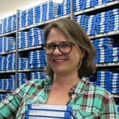 Volunteer working in stacks