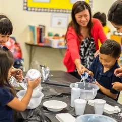 School-age children doing experiment