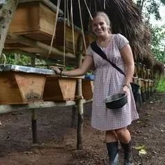 Volunteers at a bee farm