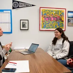 CR students meeting with professor