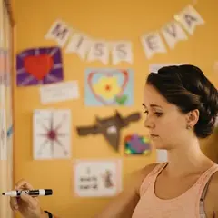 BECA teacher writing on the board in her classroom at Santa Monica Bilingual School