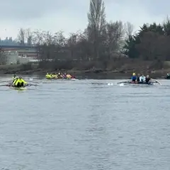 Mill Town Rowing athletes staying safe in hi-viz as they navigate the Snohomish River, training near Langus Riverfront Park in Everett, Washington.