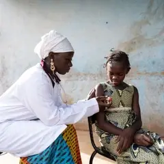 child in hospital waiting for immunisation