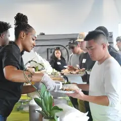 Corporate volunteers in Los Angeles, supporting a local restaurant.