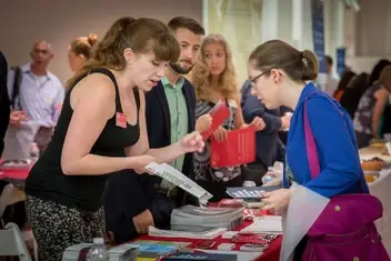 A prospective student speaks with an admissions representative.