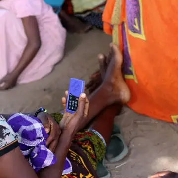 Rural Women listening to Audiopedia in Tanzania