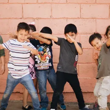 Kindergarten students dabbing (or attempting to at least)