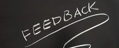 A chalkboard with 'Feedback' written on it.