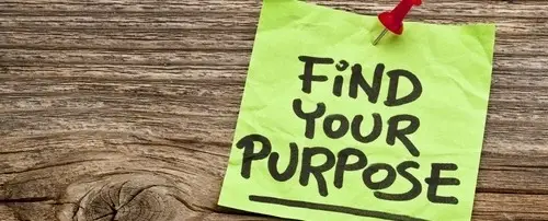 Green stickie that says, "Find your purpose."