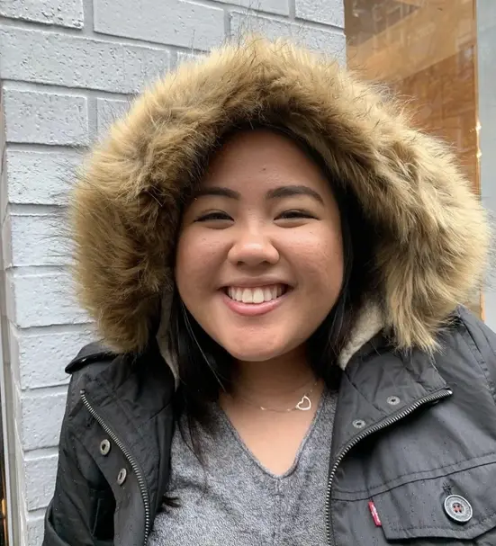 A photo of Micah Tan Kelley wearing a winter jacket.