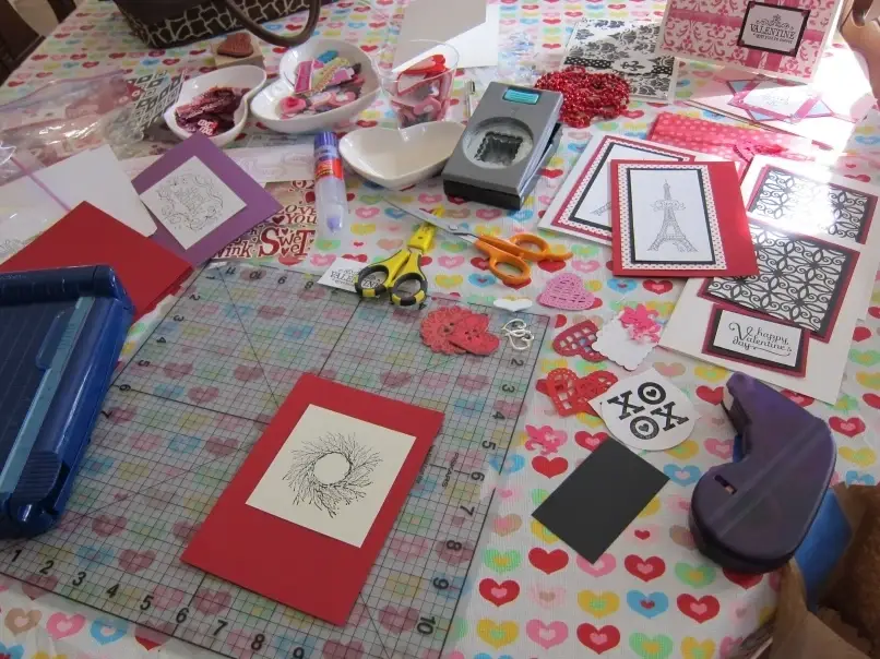 Supplies for a card making party on a table.