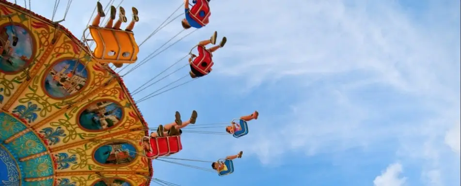 People riding a swing ride.