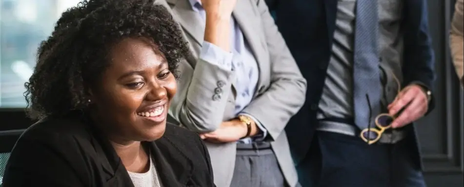 A Black woman in a job interview.