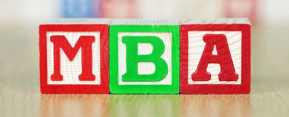 Wooden blocks that say MBA.