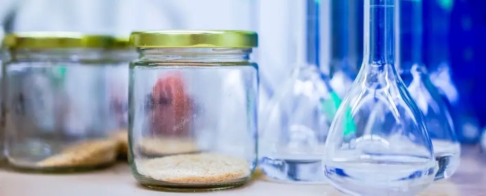 Multiple jars and beakers.