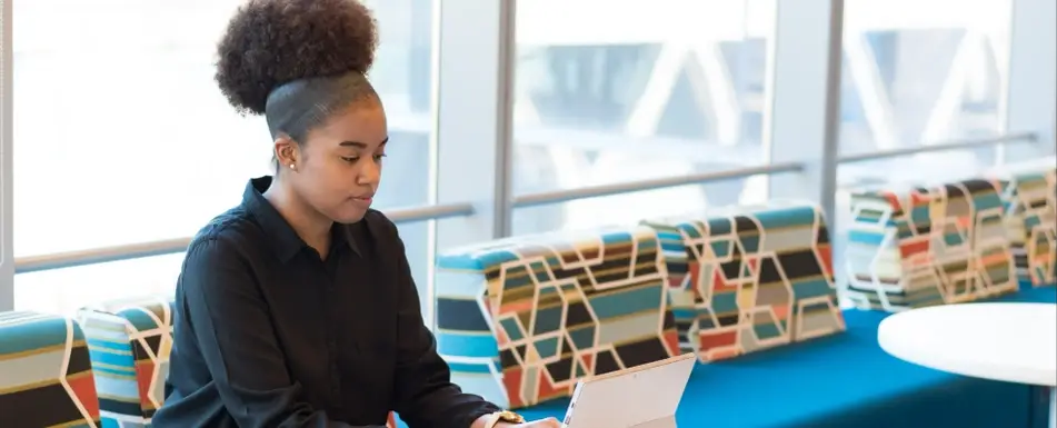 woman looking at laptop