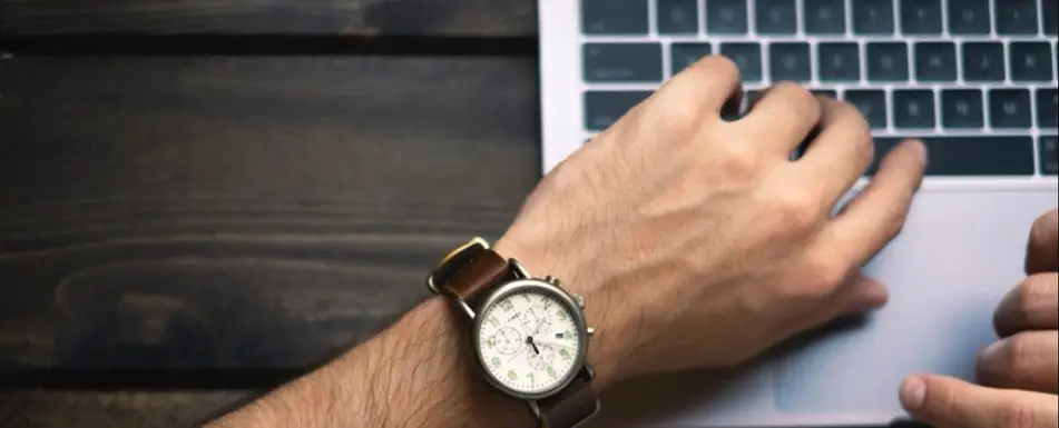 A man working at his laptop.