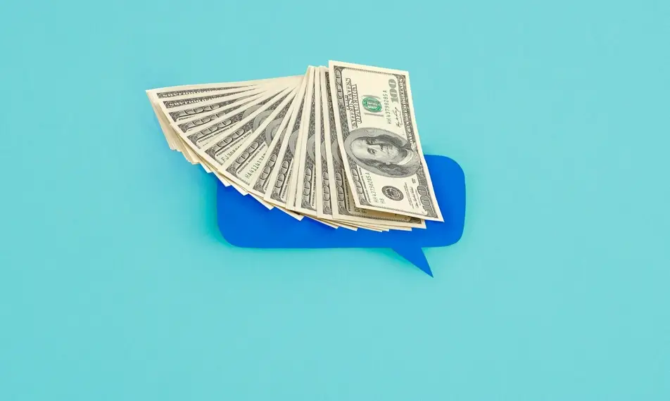 Illustration of several US dollars on a teal background with a dark blue speech bubble.