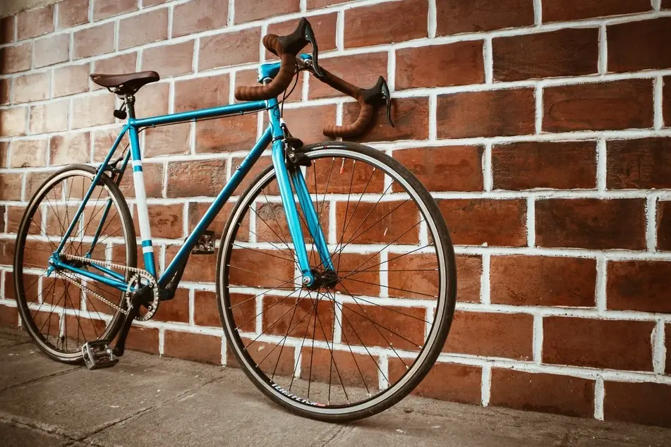 bicycle against a brick wall