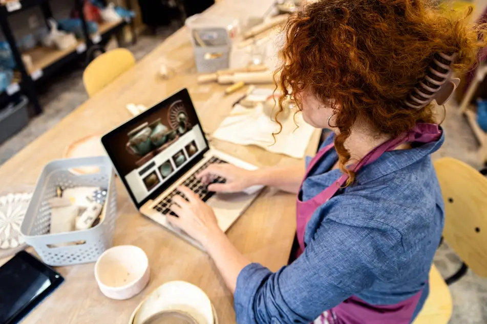 Baker looks at her website for personal branding purposes.