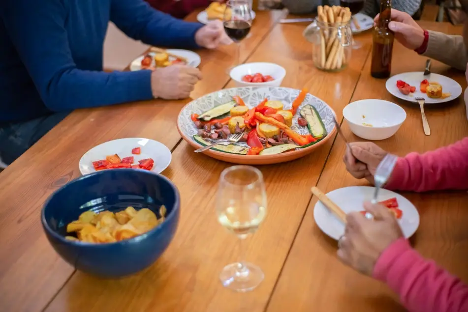 communal table with food and drinks